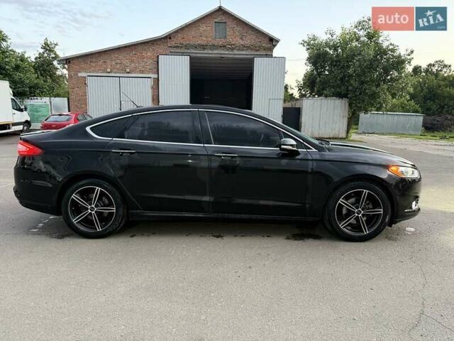 Черный Форд Фьюжн, объемом двигателя 2 л и пробегом 107 тыс. км за 11200 $, фото 18 на Automoto.ua