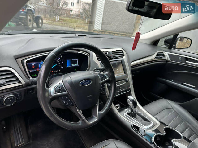 Чорний Форд Фьюжен, об'ємом двигуна 2 л та пробігом 235 тис. км за 10850 $, фото 16 на Automoto.ua