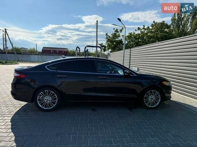 Форд Фьюжн 2014 в Николаеве на Automoto.ua Черный Форд Фьюжн, объемом двигателя 2 л и пробегом 218 тыс. км за 9800 $, фото 4 на Automoto.ua