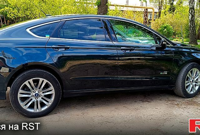 Чорний Форд Фьюжен, об'ємом двигуна 2 л та пробігом 132 тис. км за 12000 $, фото 5 на Automoto.ua