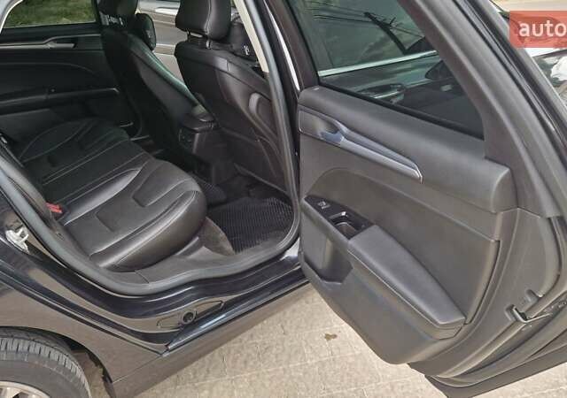 Черный Форд Фьюжн, объемом двигателя 2 л и пробегом 135 тыс. км за 13000 $, фото 9 на Automoto.ua