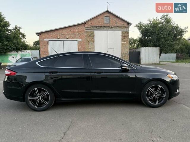 Черный Форд Фьюжн, объемом двигателя 2 л и пробегом 107 тыс. км за 11200 $, фото 4 на Automoto.ua