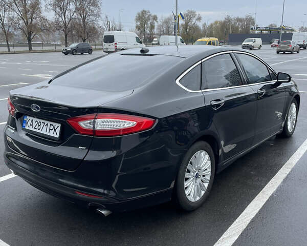 Чорний Форд Фьюжен, об'ємом двигуна 2 л та пробігом 131 тис. км за 11999 $, фото 4 на Automoto.ua