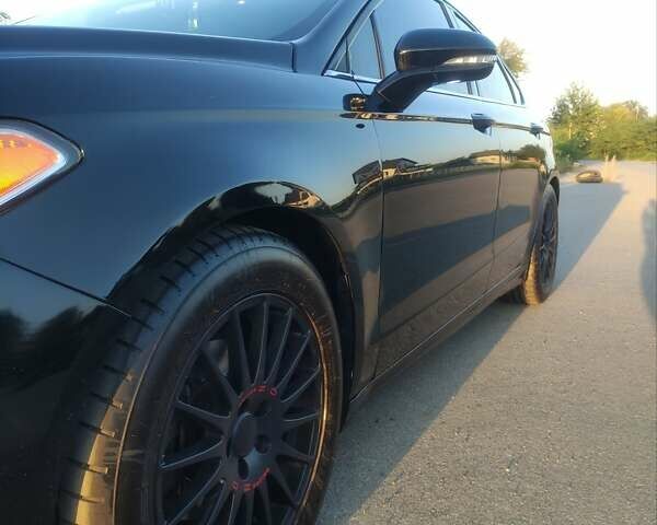 Чорний Форд Фьюжен, об'ємом двигуна 2.5 л та пробігом 178 тис. км за 10800 $, фото 10 на Automoto.ua