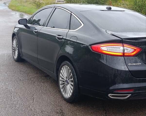 Черный Форд Фьюжн, объемом двигателя 2 л и пробегом 300 тыс. км за 12500 $, фото 5 на Automoto.ua