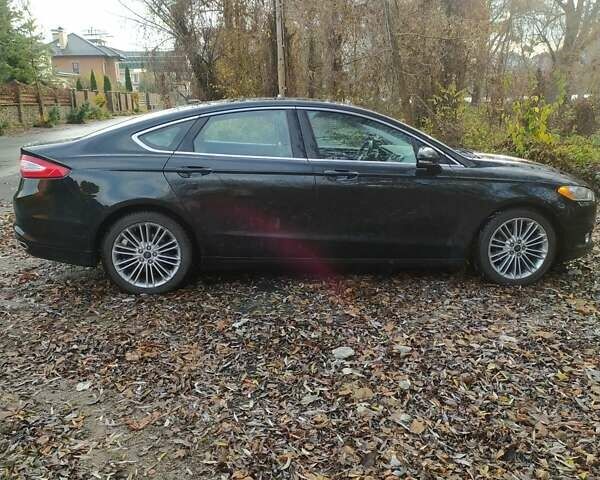 Чорний Форд Фьюжен, об'ємом двигуна 2 л та пробігом 268 тис. км за 9400 $, фото 4 на Automoto.ua