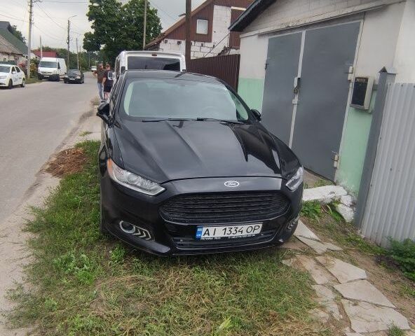 Черный Форд Фьюжн, объемом двигателя 2 л и пробегом 200 тыс. км за 9800 $, фото 2 на Automoto.ua