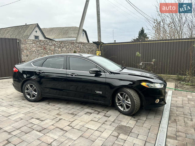 Чорний Форд Фьюжен, об'ємом двигуна 2 л та пробігом 101 тис. км за 12300 $, фото 1 на Automoto.ua