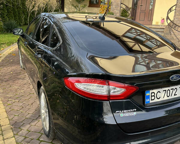 Чорний Форд Фьюжен, об'ємом двигуна 2 л та пробігом 241 тис. км за 11200 $, фото 4 на Automoto.ua