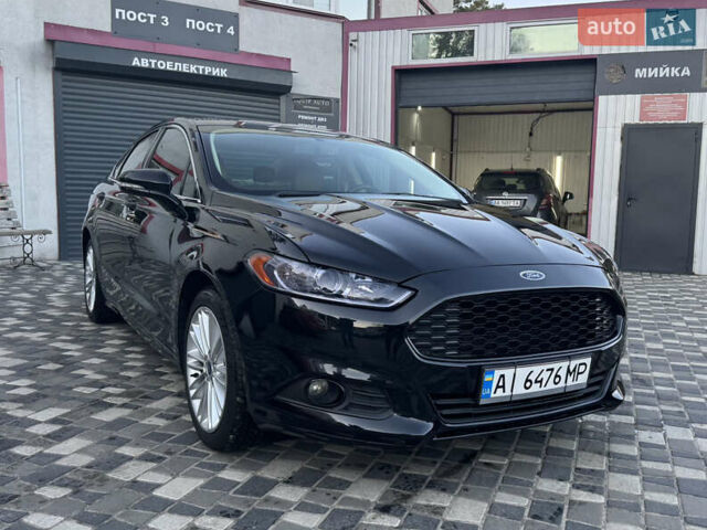 Черный Форд Фьюжн, объемом двигателя 2 л и пробегом 161 тыс. км за 11000 $, фото 6 на Automoto.ua