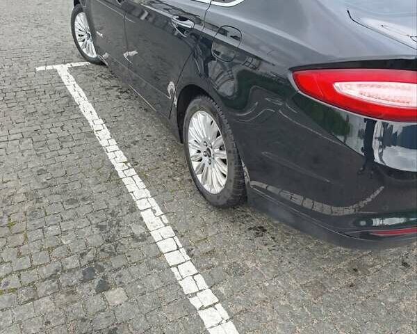 Чорний Форд Фьюжен, об'ємом двигуна 2 л та пробігом 183 тис. км за 12000 $, фото 4 на Automoto.ua