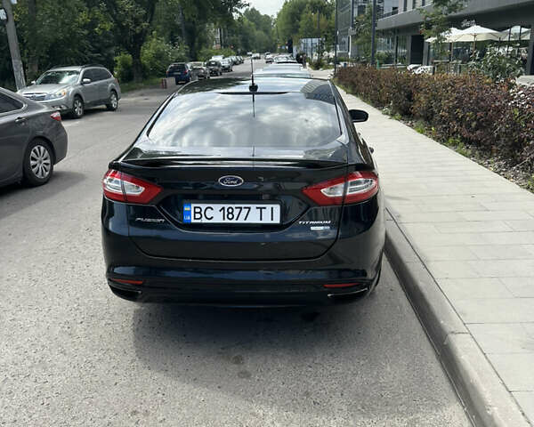 Чорний Форд Фьюжен, об'ємом двигуна 2 л та пробігом 225 тис. км за 10800 $, фото 4 на Automoto.ua
