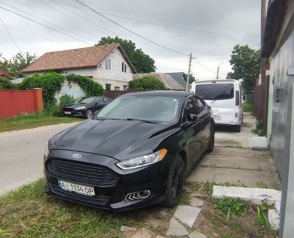 Черный Форд Фьюжн, объемом двигателя 2 л и пробегом 200 тыс. км за 9800 $, фото 1 на Automoto.ua