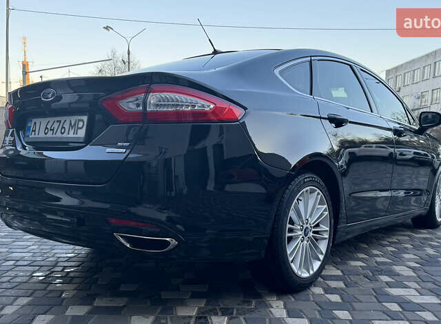 Черный Форд Фьюжн, объемом двигателя 2 л и пробегом 161 тыс. км за 11000 $, фото 4 на Automoto.ua