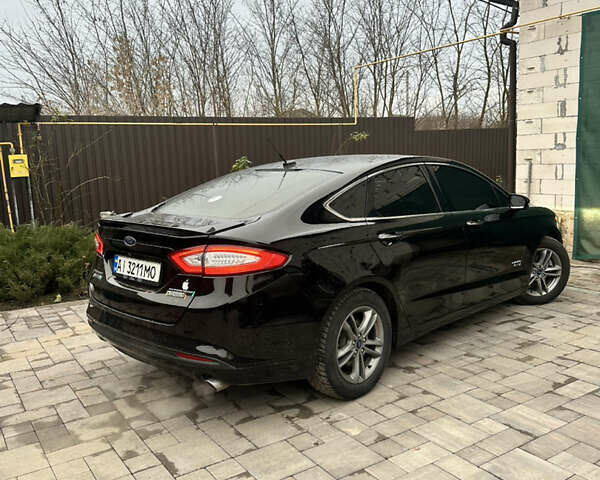 Чорний Форд Фьюжен, об'ємом двигуна 2 л та пробігом 101 тис. км за 12300 $, фото 3 на Automoto.ua
