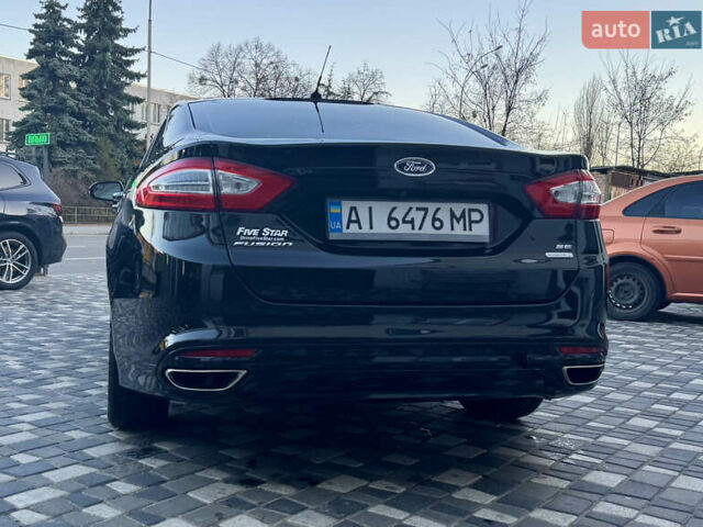Черный Форд Фьюжн, объемом двигателя 2 л и пробегом 161 тыс. км за 11000 $, фото 3 на Automoto.ua