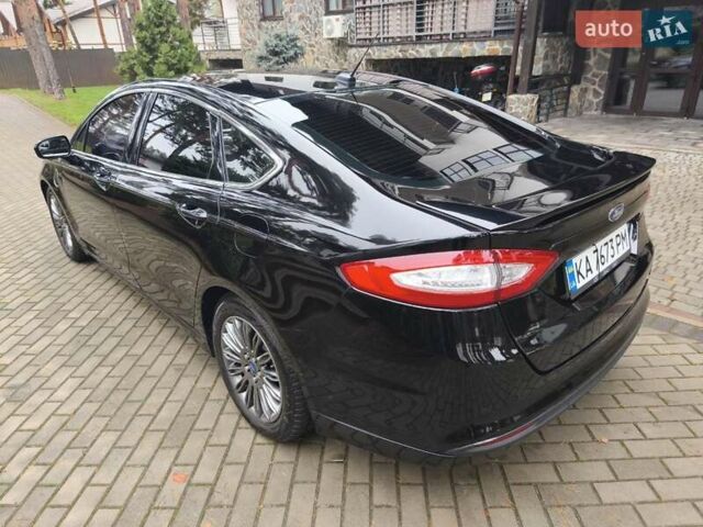 Черный Форд Фьюжн, объемом двигателя 2 л и пробегом 190 тыс. км за 10800 $, фото 4 на Automoto.ua