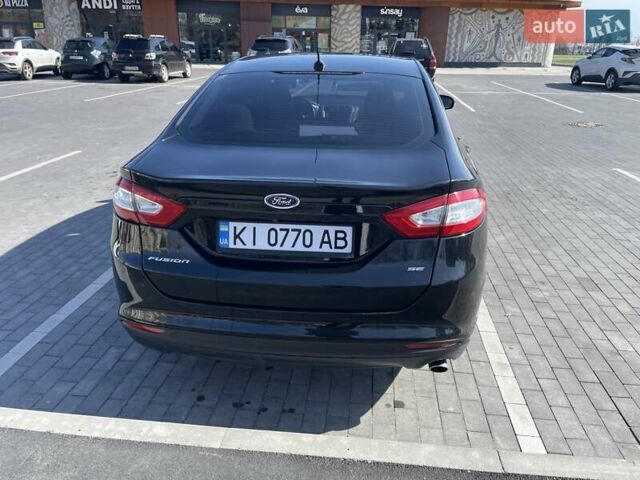 Чорний Форд Фьюжен, об'ємом двигуна 2 л та пробігом 190 тис. км за 13800 $, фото 2 на Automoto.ua