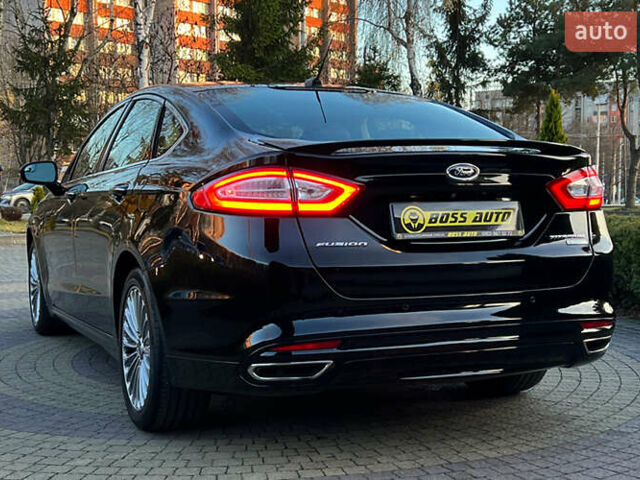 Чорний Форд Фьюжен, об'ємом двигуна 2 л та пробігом 170 тис. км за 11500 $, фото 4 на Automoto.ua