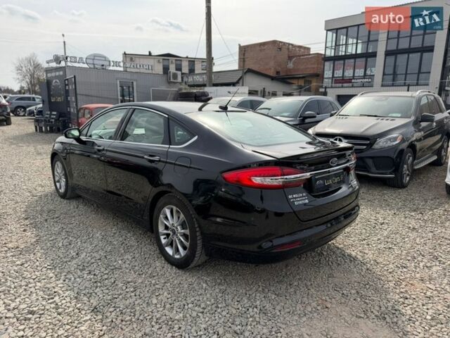 Чорний Форд Фьюжен, об'ємом двигуна 2 л та пробігом 99 тис. км за 13999 $, фото 10 на Automoto.ua
