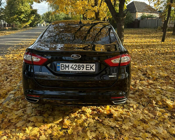 Черный Форд Фьюжн, объемом двигателя 2 л и пробегом 250 тыс. км за 9900 $, фото 7 на Automoto.ua