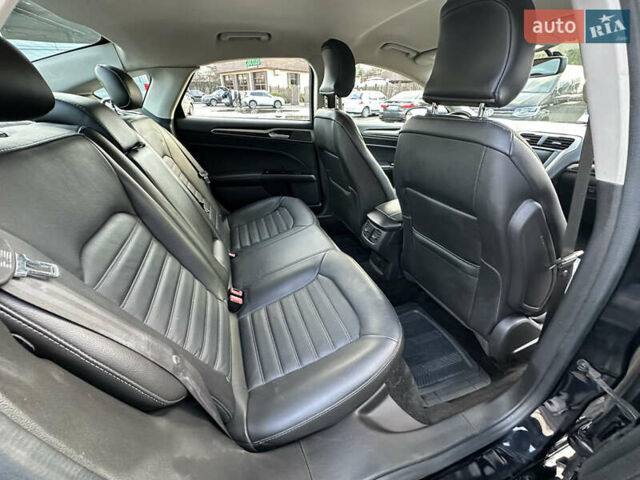 Чорний Форд Фьюжен, об'ємом двигуна 2 л та пробігом 120 тис. км за 10900 $, фото 9 на Automoto.ua