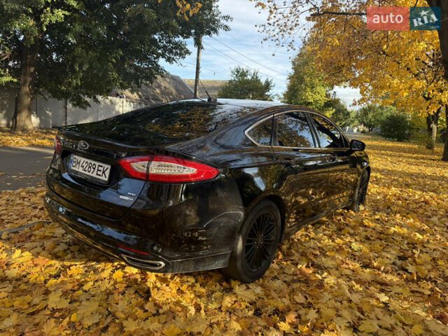 Черный Форд Фьюжн, объемом двигателя 2 л и пробегом 250 тыс. км за 9900 $, фото 9 на Automoto.ua