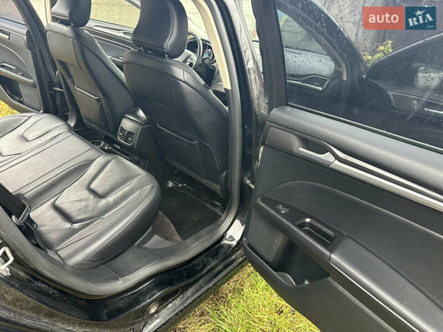 Чорний Форд Фьюжен, об'ємом двигуна 2 л та пробігом 193 тис. км за 13000 $, фото 38 на Automoto.ua