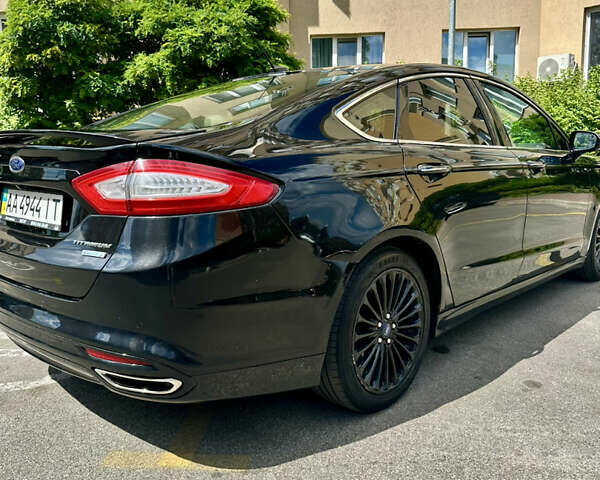 Чорний Форд Фьюжен, об'ємом двигуна 2 л та пробігом 168 тис. км за 11800 $, фото 8 на Automoto.ua