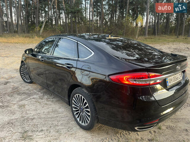 Чорний Форд Фьюжен, об'ємом двигуна 2 л та пробігом 193 тис. км за 13000 $, фото 4 на Automoto.ua