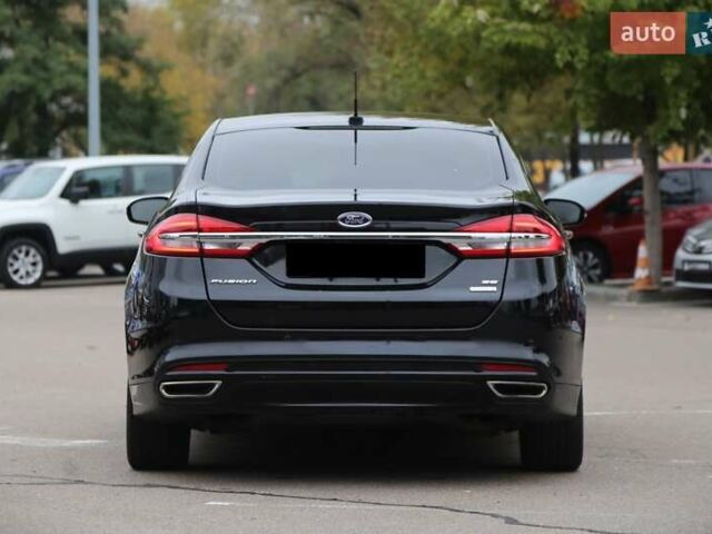 Чорний Форд Фьюжен, об'ємом двигуна 2 л та пробігом 192 тис. км за 12500 $, фото 2 на Automoto.ua