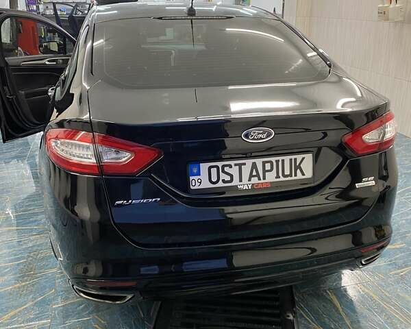 Черный Форд Фьюжн, объемом двигателя 2 л и пробегом 160 тыс. км за 12500 $, фото 2 на Automoto.ua