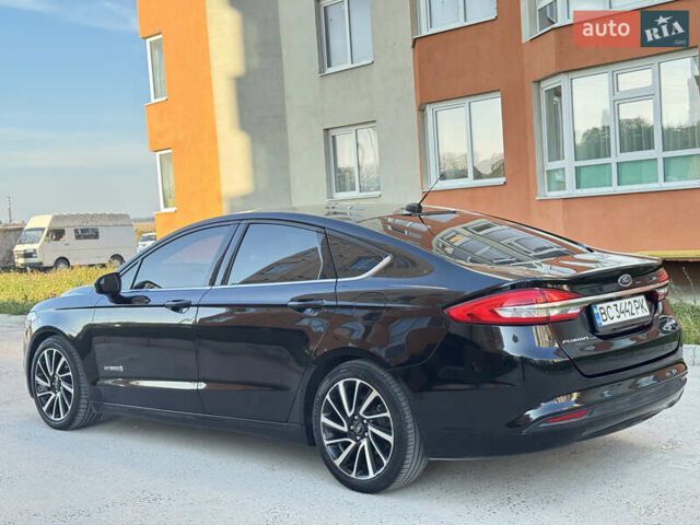 Чорний Форд Фьюжен, об'ємом двигуна 2 л та пробігом 171 тис. км за 12900 $, фото 4 на Automoto.ua
