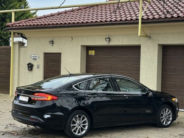 Чорний Форд Фьюжен, об'ємом двигуна 2 л та пробігом 200 тис. км за 13000 $, фото 3 на Automoto.ua