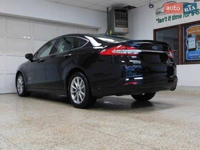 Черный Форд Фьюжн, объемом двигателя 2 л и пробегом 100 тыс. км за 3000 $, фото 1 на Automoto.ua
