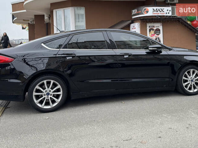 Черный Форд Фьюжн, объемом двигателя 1.5 л и пробегом 169 тыс. км за 10755 $, фото 1 на Automoto.ua