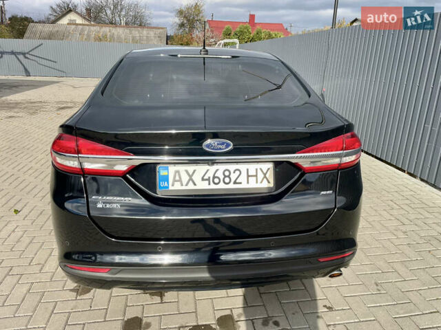 Форд Фьюжн 2017 в Остоге на Automoto.ua Черный Форд Фьюжн, объемом двигателя 2.49 л и пробегом 189 тыс. км за 10700 $, фото 7 на Automoto.ua
