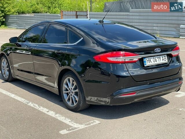 Чорний Форд Фьюжен, об'ємом двигуна 2 л та пробігом 218 тис. км за 12600 $, фото 7 на Automoto.ua