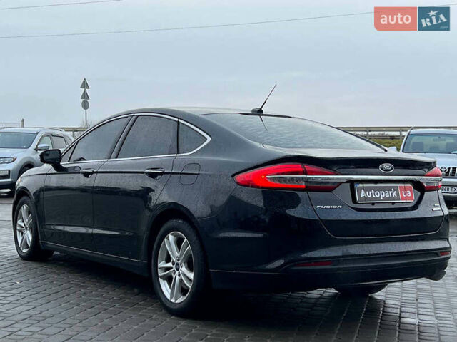 Чорний Форд Фьюжен, об'ємом двигуна 1.5 л та пробігом 112 тис. км за 11940 $, фото 4 на Automoto.ua
