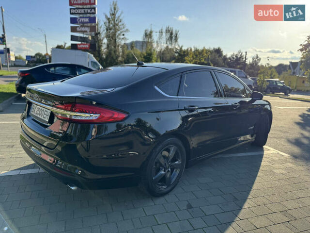 Чорний Форд Фьюжен, об'ємом двигуна 2 л та пробігом 156 тис. км за 14000 $, фото 13 на Automoto.ua