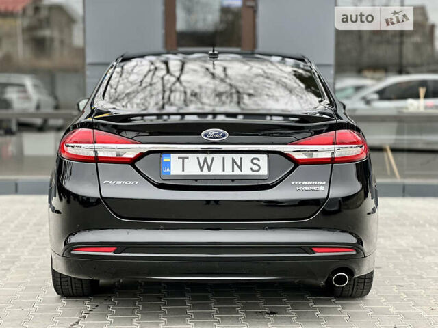 Чорний Форд Фьюжен, об'ємом двигуна 2 л та пробігом 111 тис. км за 17900 $, фото 4 на Automoto.ua