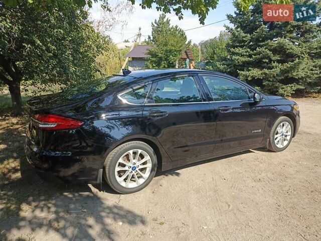 Чорний Форд Фьюжен, об'ємом двигуна 2 л та пробігом 164 тис. км за 15950 $, фото 4 на Automoto.ua