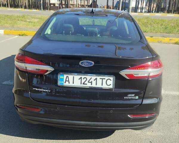 Чорний Форд Фьюжен, об'ємом двигуна 2 л та пробігом 161 тис. км за 16700 $, фото 6 на Automoto.ua