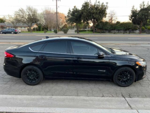 Черный Форд Фьюжн, объемом двигателя 2 л и пробегом 47 тыс. км за 9000 $, фото 3 на Automoto.ua