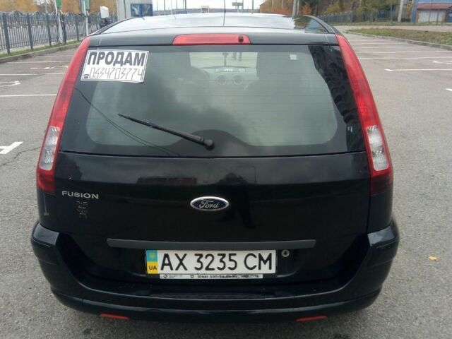 Черный Форд Фьюжн, объемом двигателя 1.6 л и пробегом 213 тыс. км за 6100 $, фото 2 на Automoto.ua