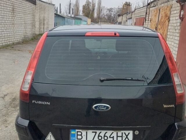 Чорний Форд Фьюжен, об'ємом двигуна 1.4 л та пробігом 212 тис. км за 5400 $, фото 4 на Automoto.ua