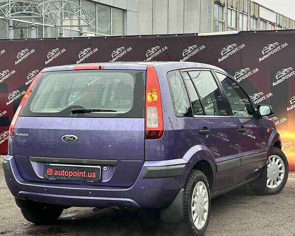 Фиолетовый Форд Фьюжн, объемом двигателя 1.39 л и пробегом 111 тыс. км за 4500 $, фото 6 на Automoto.ua