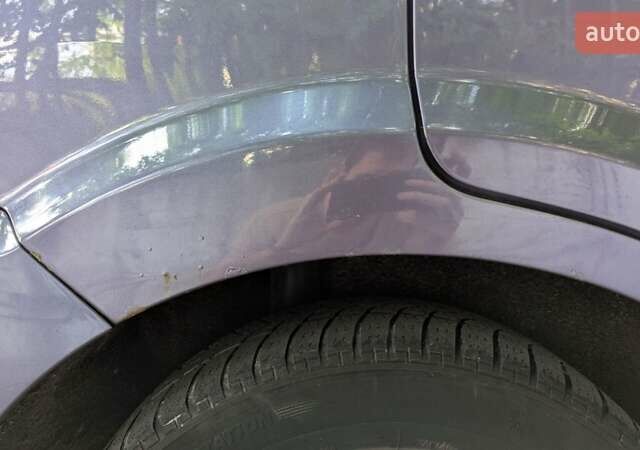 Фіолетовий Форд Фьюжен, об'ємом двигуна 1.4 л та пробігом 241 тис. км за 3900 $, фото 7 на Automoto.ua