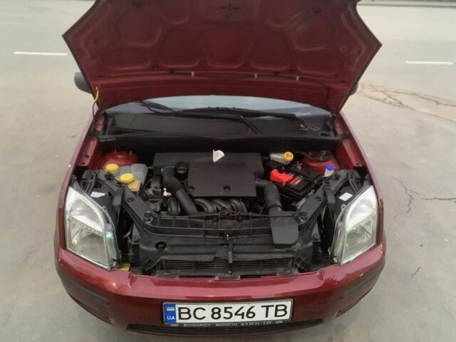 Красный Форд Фьюжн, объемом двигателя 1.4 л и пробегом 280 тыс. км за 3800 $, фото 7 на Automoto.ua