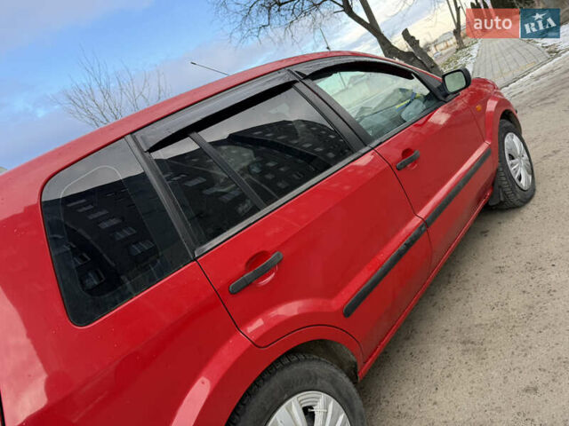 Червоний Форд Фьюжен, об'ємом двигуна 1.4 л та пробігом 285 тис. км за 2999 $, фото 12 на Automoto.ua